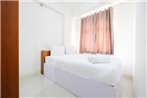 2BR Green Pramuka City Apartment Direct Access to Mall By Travelio